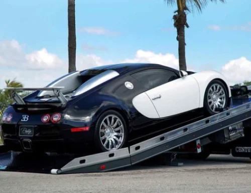 Sports car recovery service in Abu Dhabi transporting luxury vehicle safely
